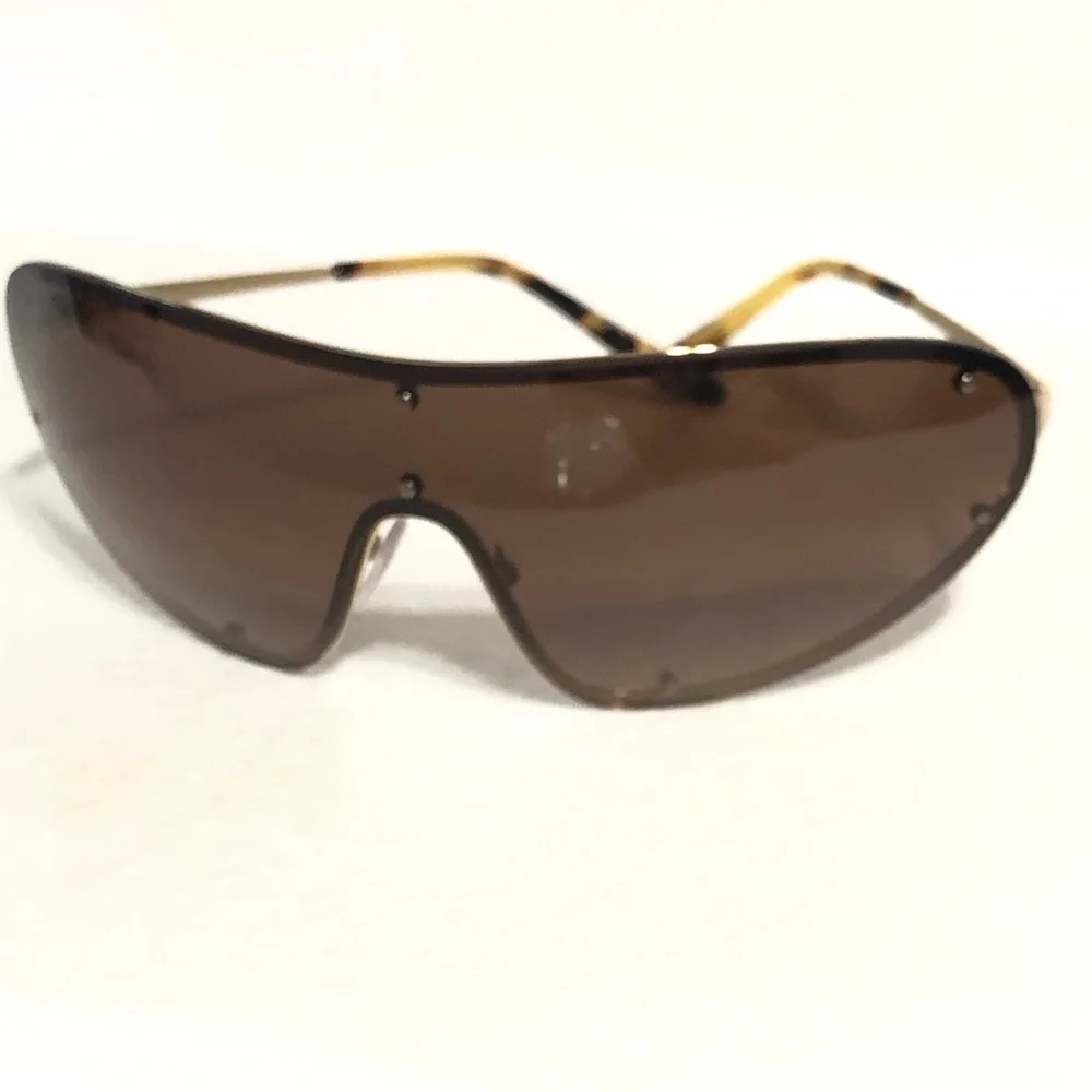 🆕 Prada bronze/brown studded shield sunglasses made in Italy